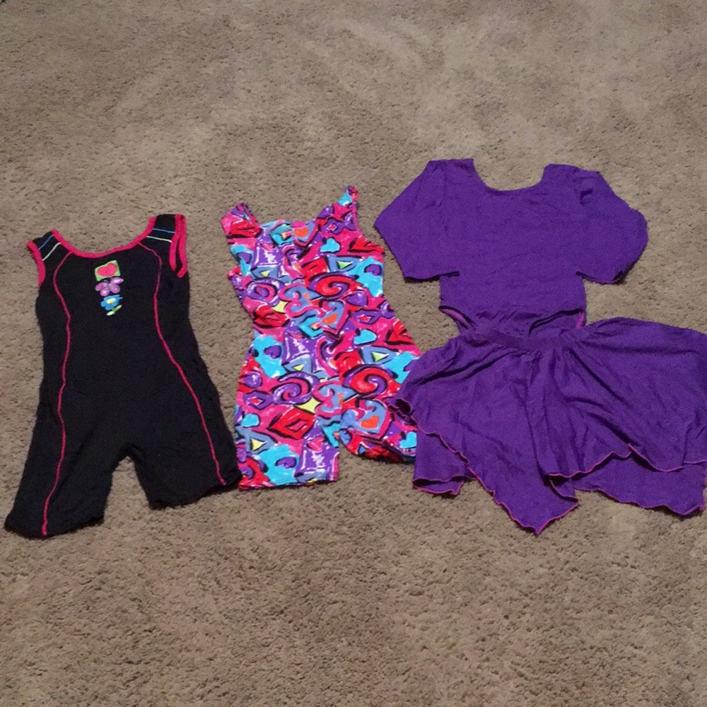 Four piece Moret gymnastic leotards and skirt Sz M 8-10